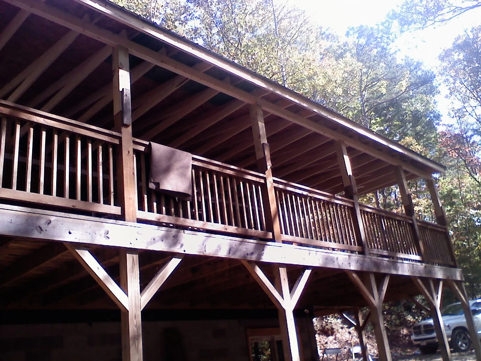 Timber framing under a new elevated porch and deck — Roof Leak Repair in Center City by Roofing Brothers